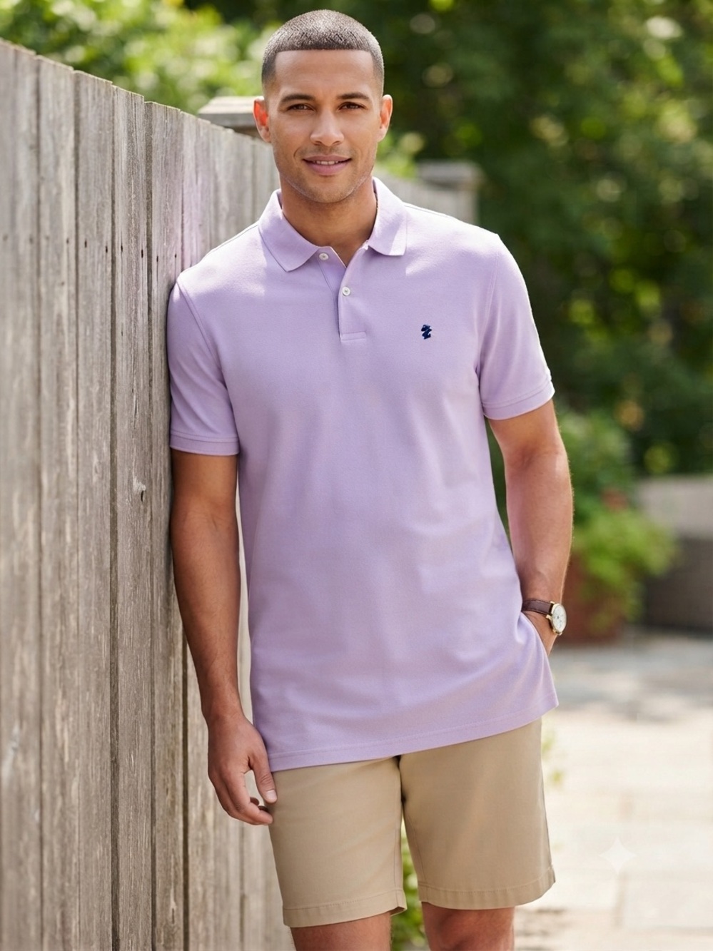 IZOD Men’s Light Lavender Polo with Blue Logo, size large. NWOT